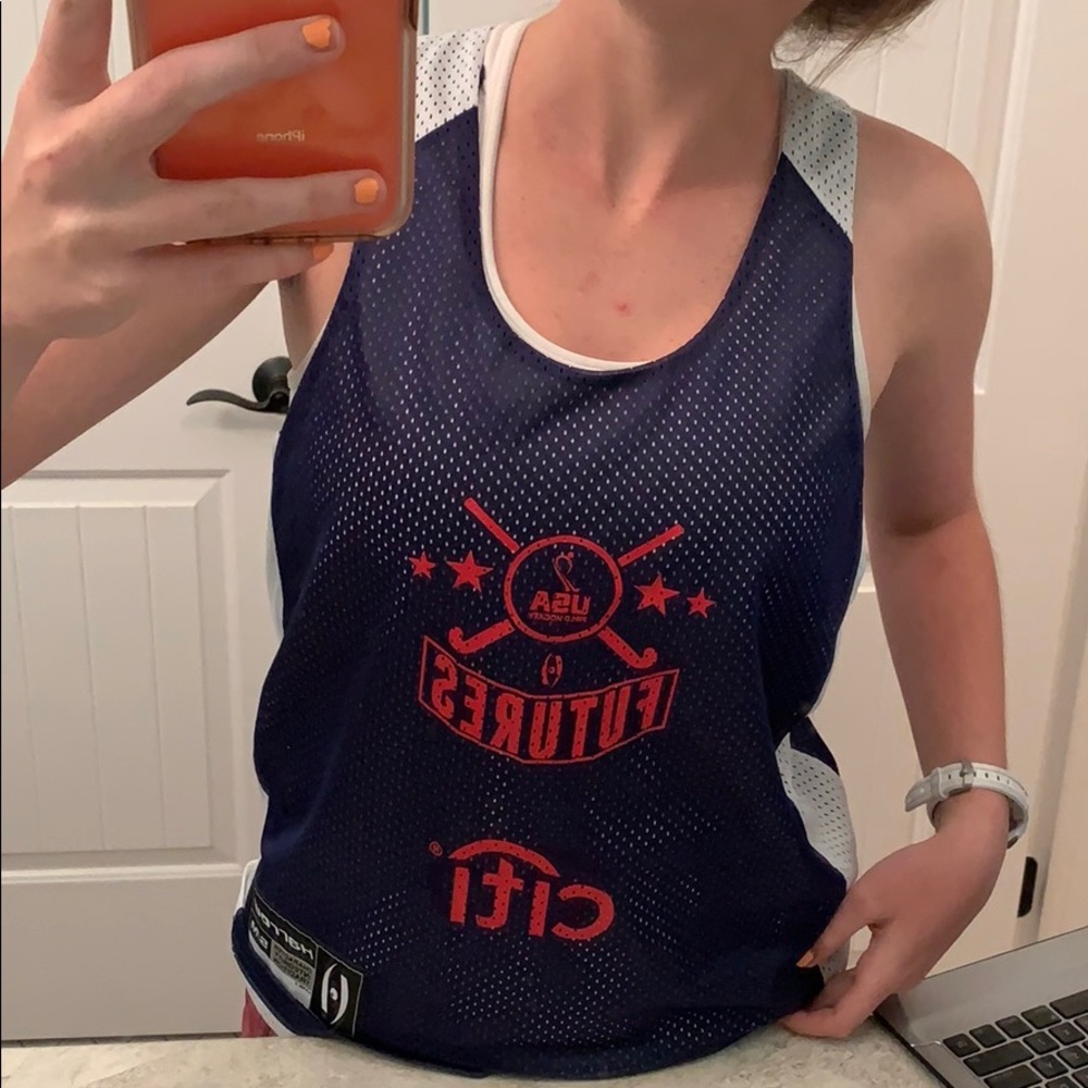 Reversible pinnie which says CITI and FUTURES.